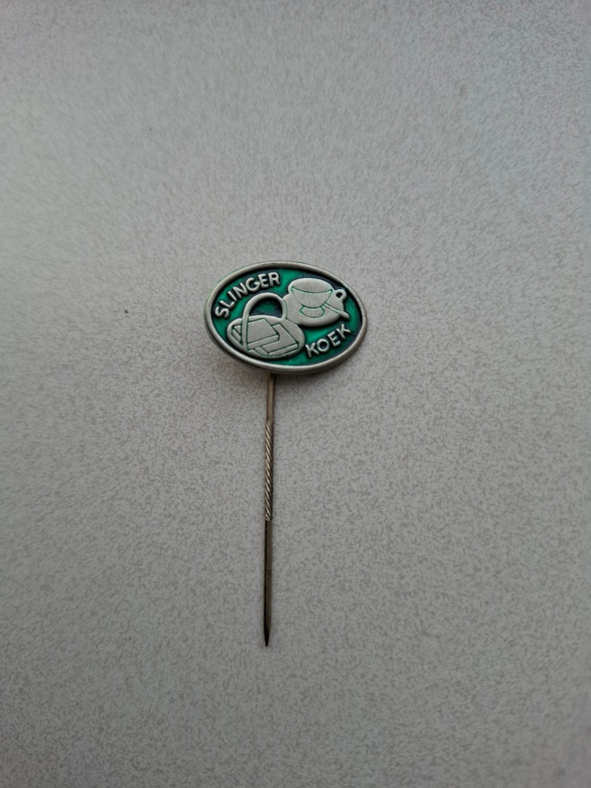 Vintage speldje pin prikker steekspeld Slinger Koek, Ophalen of Verzenden