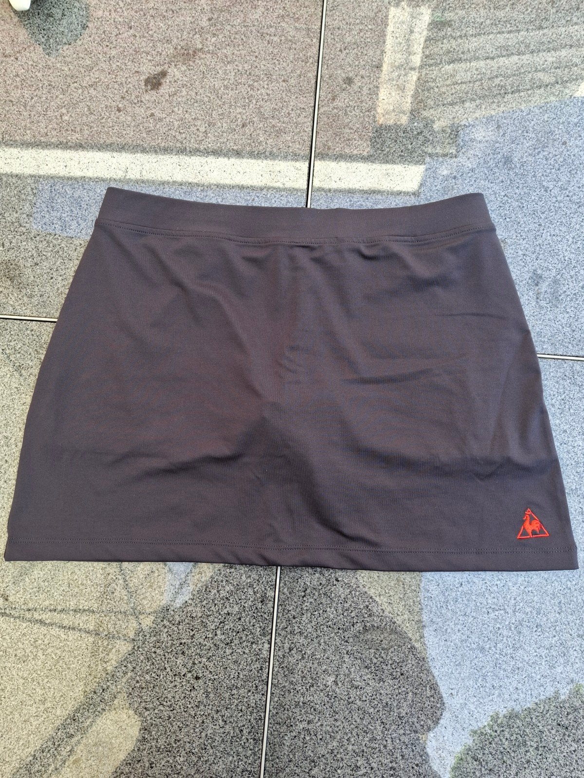 Le Coq Sportif sportrokje met geïntegreerde short - Maat M, Maat 38/40 (M), Ophalen of Verzenden, Zo goed als nieuw, Hardlopen of Fietsen