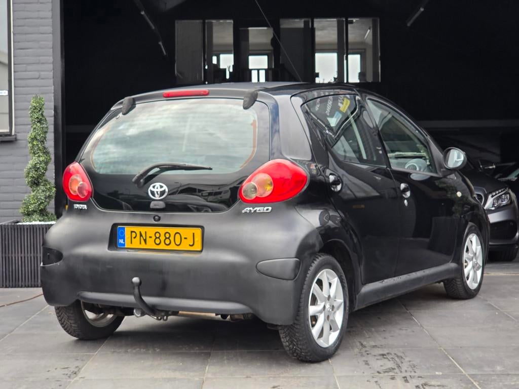 Toyota Aygo 1.0-12V|Airco|Elek.Ramen|Navi|Trekhaak|AUX, Auto's, Voorwielaandrijving, Stof, Gebruikt, 4 stoelen