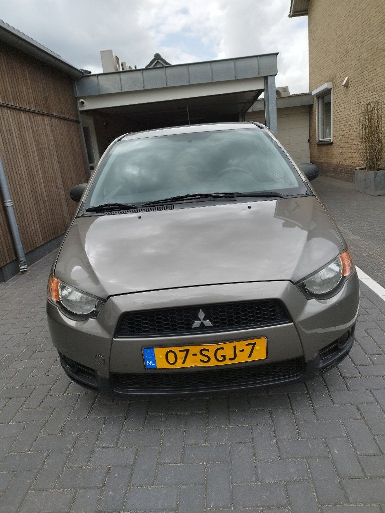 Mitsubishi Colt 1.1 3-DR 2011 Grijs, Voorwielaandrijving, Stof, 74 pk, Overige carrosserieën