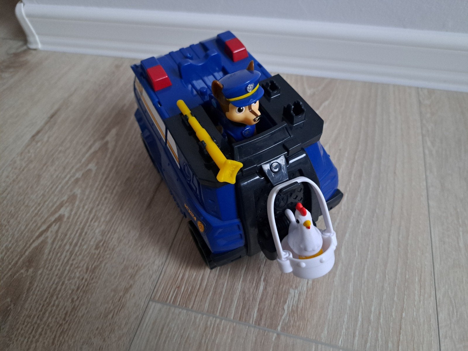 Paw patrol Chase transformerende auto, Ophalen of Verzenden, Zo goed als nieuw