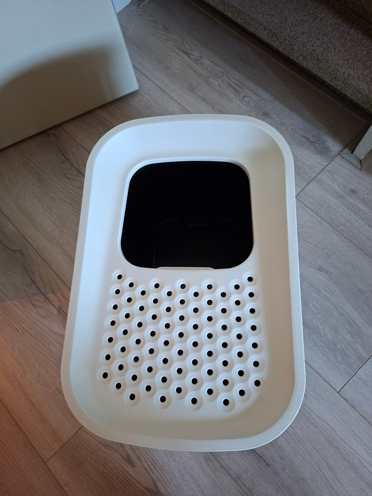 Kattenbak hop on, Ophalen