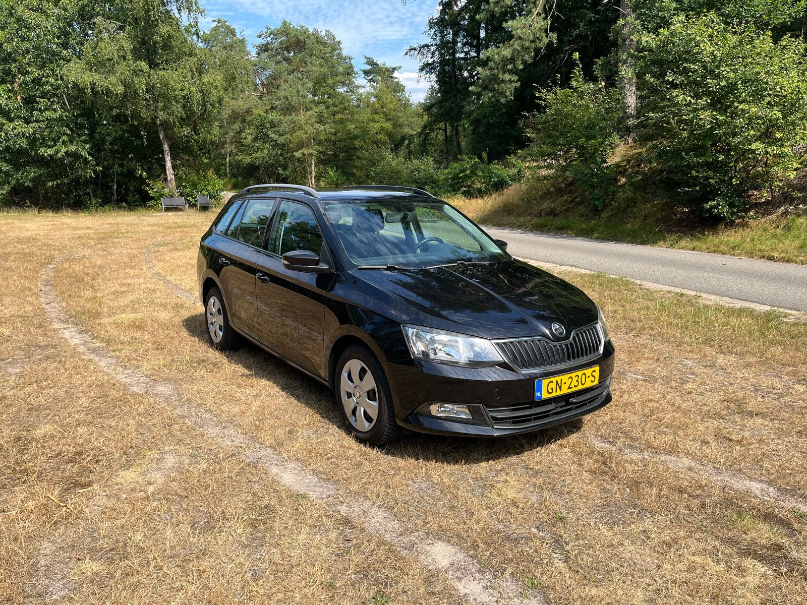 Skoda Fabia 1.0 Greentech 75pk 2015 Zwart, Auto's, 979 kg, Zwart, Origineel Nederlands, Stationwagon