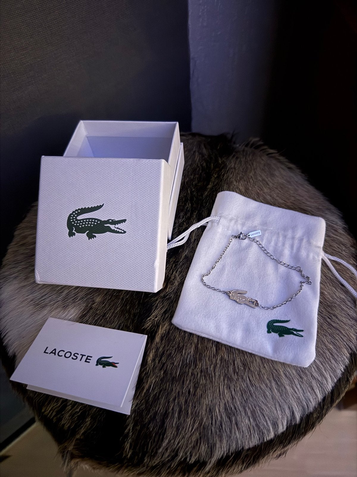 Nieuw Lacoste armbandje met krokodil logo, Staal, Nieuw, Ophalen of Verzenden, Zilver