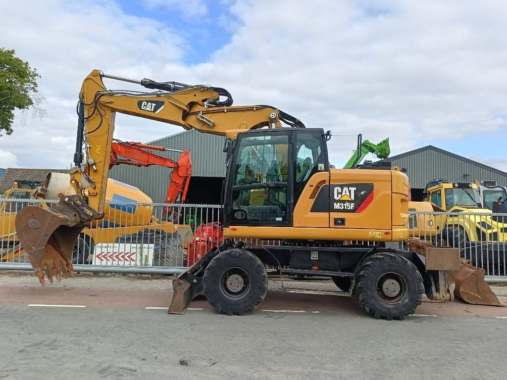 Cat M 315 F mobiele graafmachine excavator bagger (bj 2017), Graafmachine