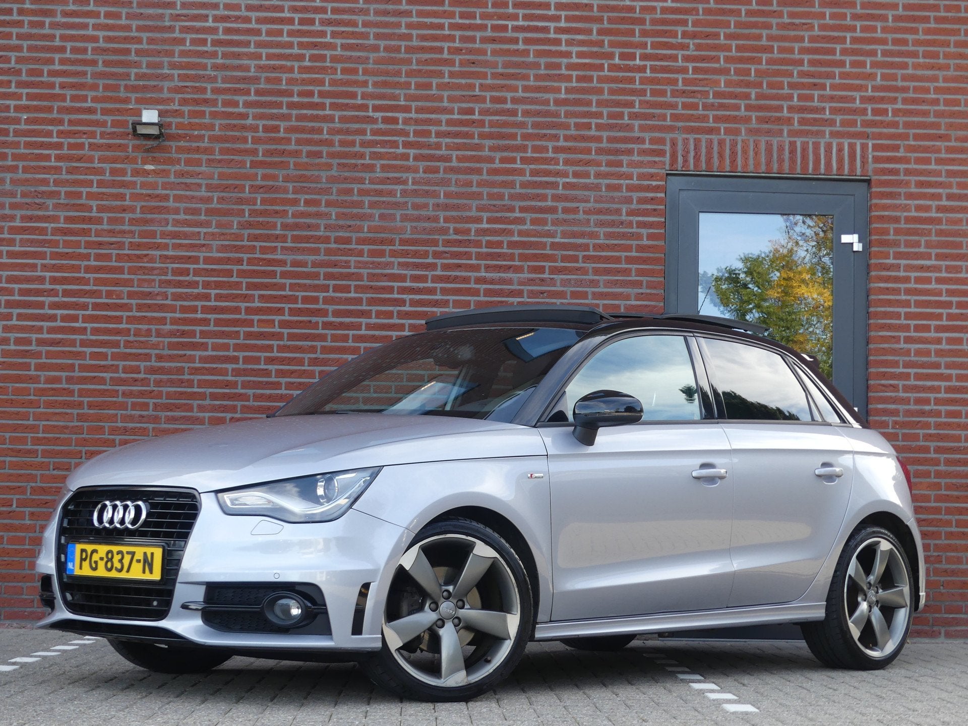 Audi A1 Sportback 1.4 TFSI Pro Line S / Automaat / Panoramad, Auto's, Audi, Euro 5, Stof, Zwart, 4 cilinders