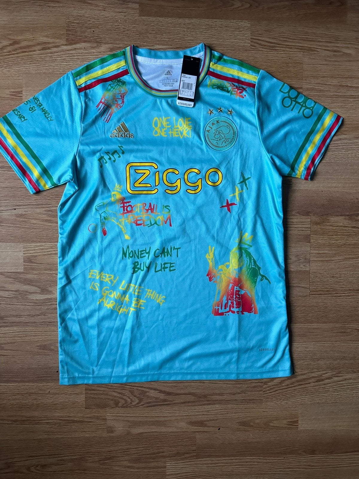 AJAX BOB MARLEY - maat L - nieuw - GRATIS VERZENDING DHL, Ophalen of Verzenden, Nieuw, Maat 52/54 (L), Blauw