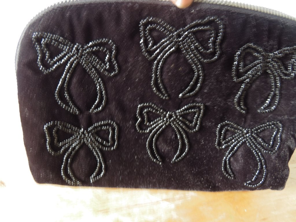 zwart fluwelen make up tasje strikjes van Hunkemöller, Ophalen of Verzenden, Gebruikt, Zwart, Dame