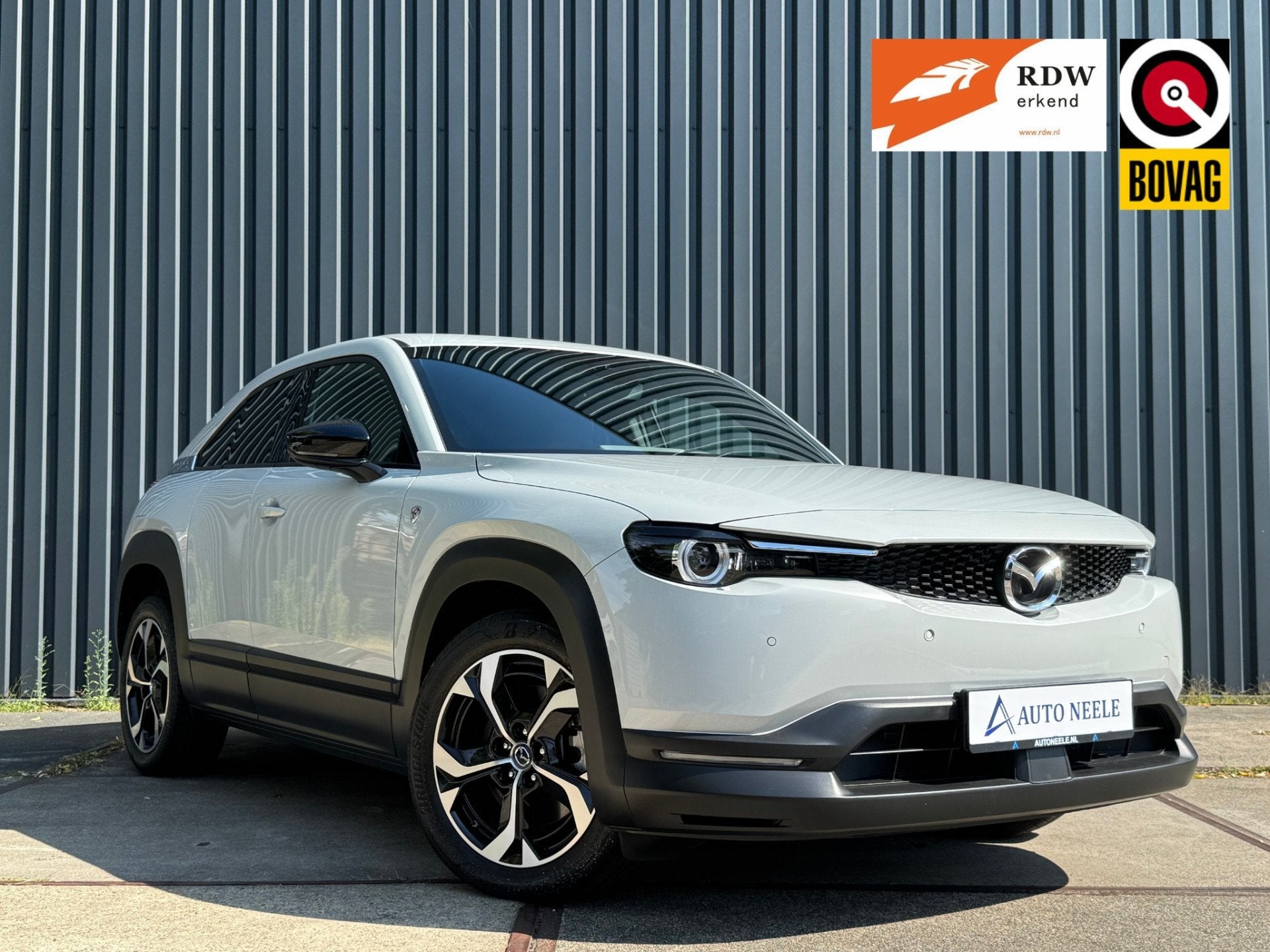 Mazda MX-30 e-SkyActiv R-EV PHEV 170 Makoto Memory Bose, Cam, Auto's, Dealer onderhouden, Gebruikt, Met garantie (alle), Leder en Stof