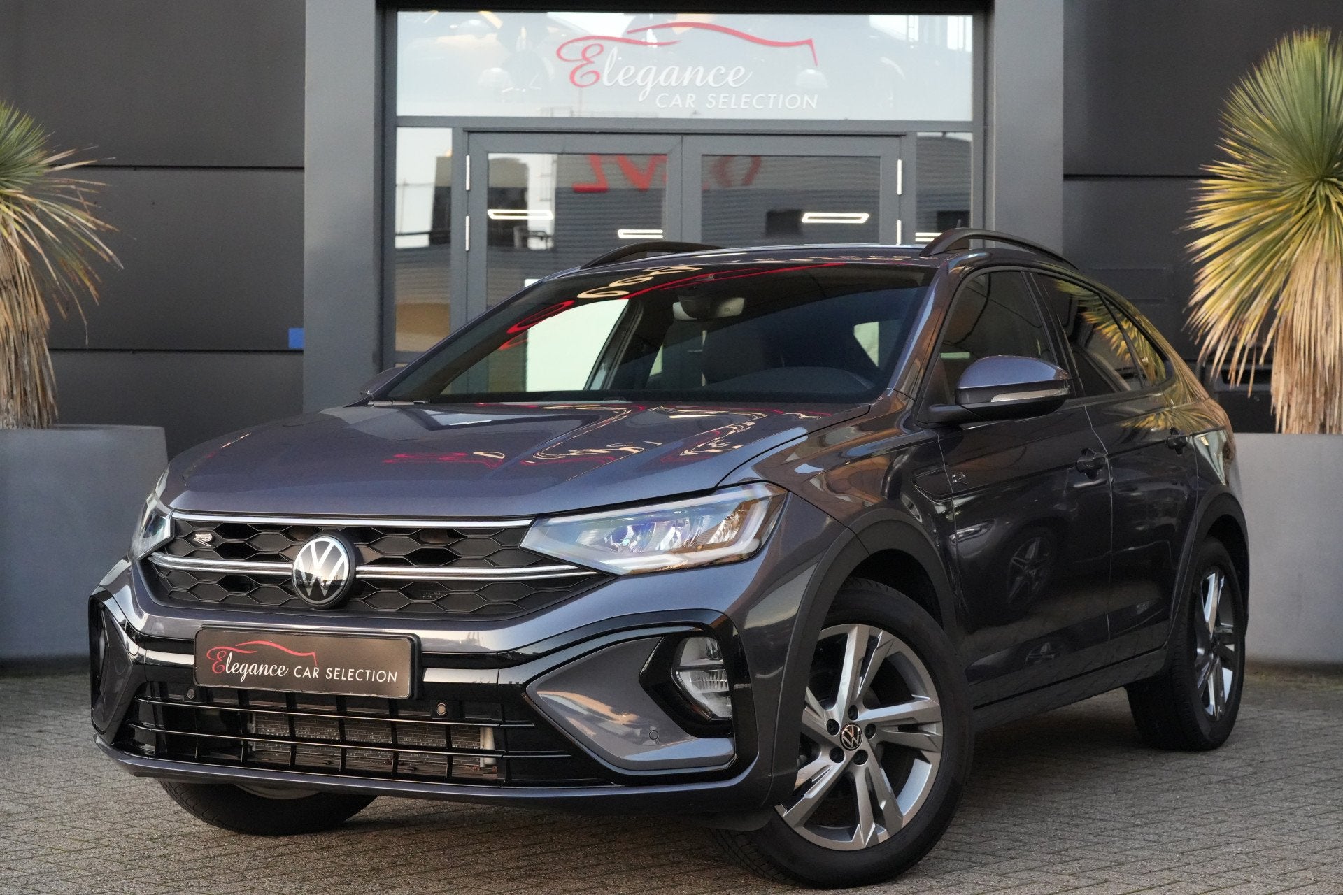 Volkswagen Taigo 1.0 TSI R-Line 116pk AppleCarPlay/Stoelverw, Auto's, Stof, Gebruikt, Zwart, 116 pk