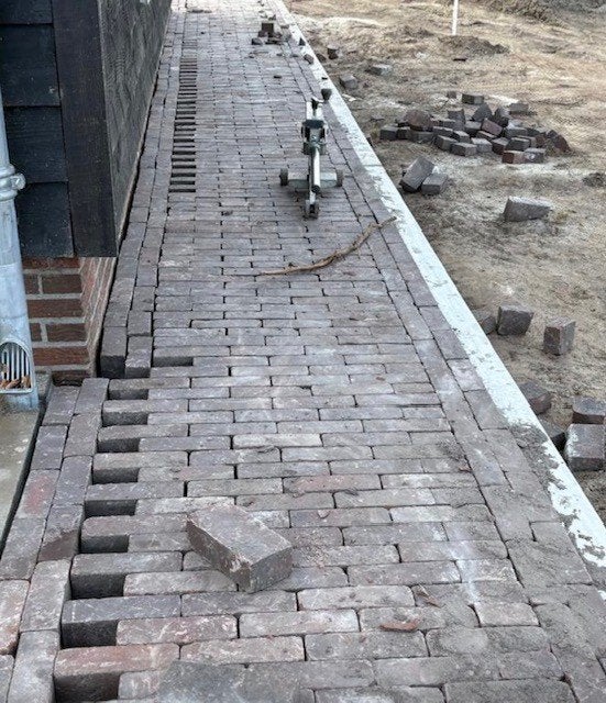 360m2 rood paars gebakken klinkers dikformaat 7-duimers