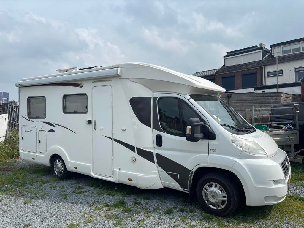 Eura Mobil Profila 2012 Queensbed, Caravans en Kamperen, Campers, Ringverwarming, Particulier, 6 tot 7 meter, Afzuigkap