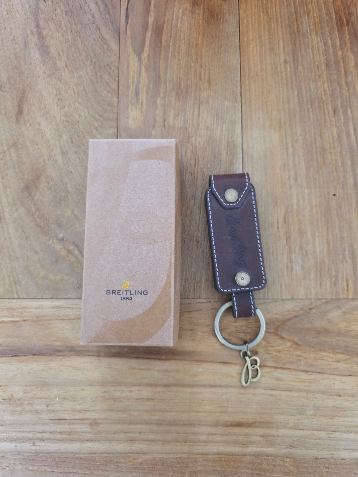 Breitling sleutelhanger leer met doosje, Breitling SA, Nieuw, Info@breitling.com, Merk