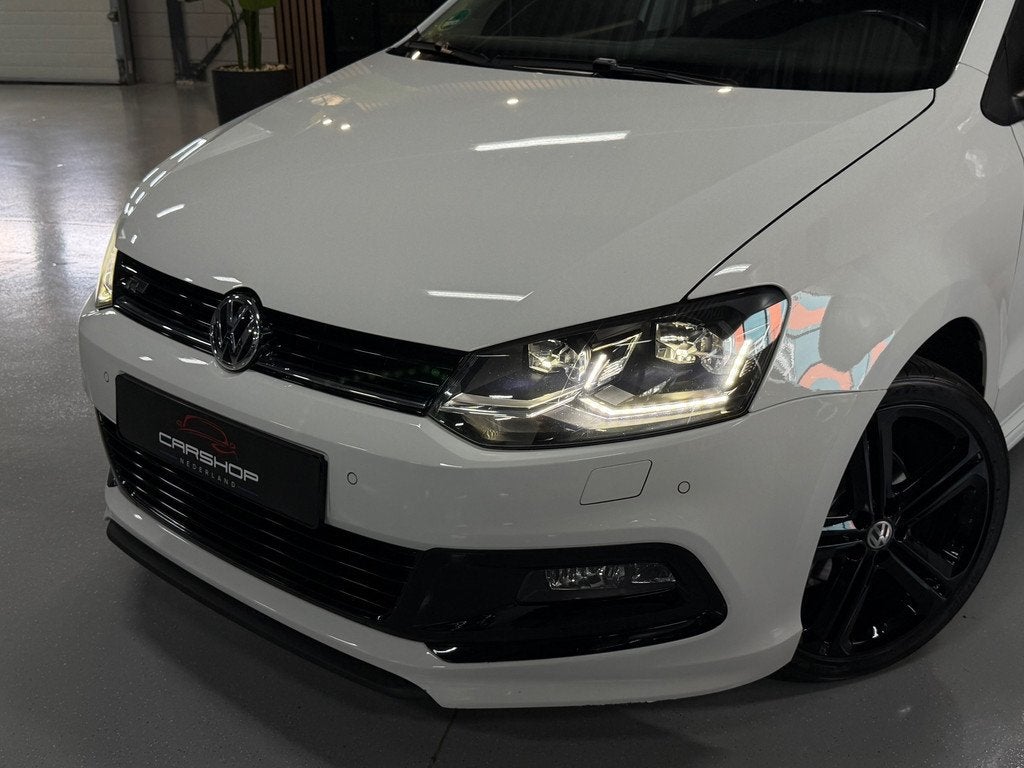 Volkswagen Polo 1.2 TSI R-Line CRUISE/NAVI/LED/STOELVRM/FUL, Stof, Gebruikt, Zwart, 4 cilinders