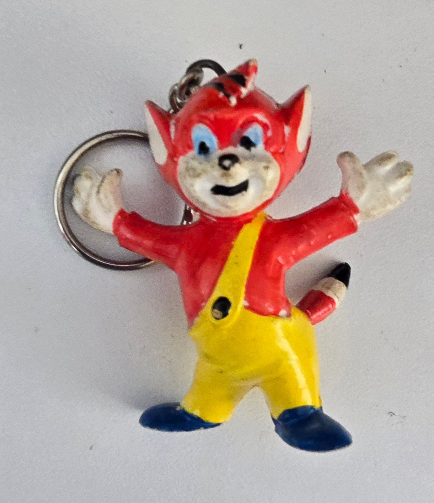 Vintage sleutelhanger met stripfiguur - rood/geel, Ophalen of Verzenden, Gebruikt, Knuffel of Figuurtje