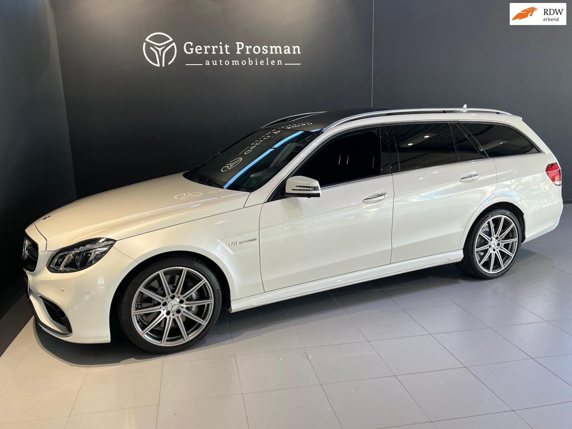 Mercedes-Benz E-klasse Estate E63 AMG 5.5 V8 Bi-Turbo 4MATIC, Auto's, Gebruikt, Wit, Leder, Geïmporteerd
