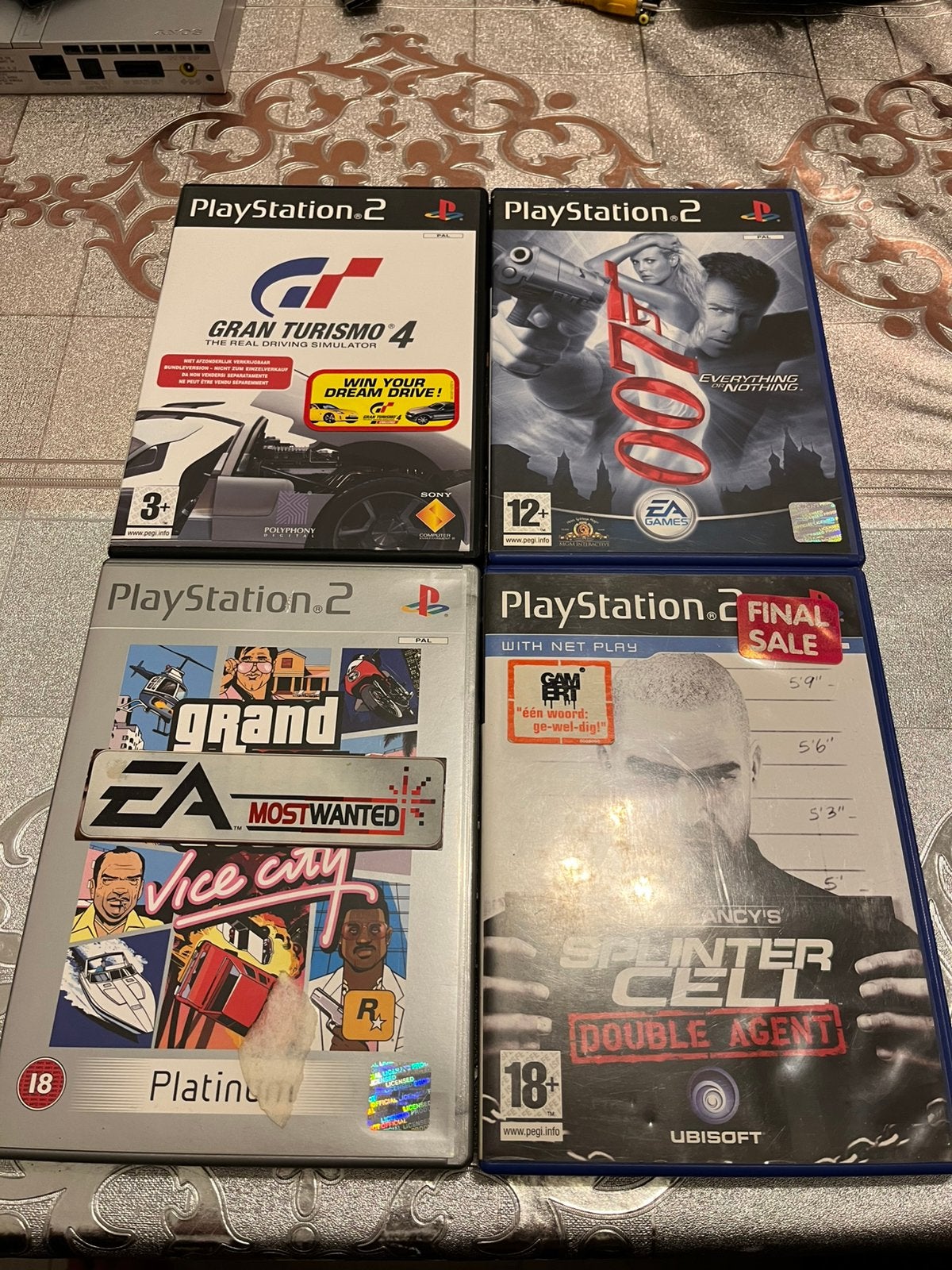 PlayStation 2 Slim Zilver + Controller, Kabels & 4 Games, Met games, Ophalen of Verzenden, Zo goed als nieuw, Met 1 controller