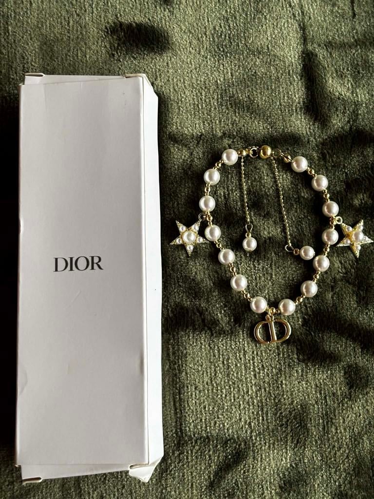 Pearl with gold CD charm bracelet, Ophalen of Verzenden, Nieuw, Goud, Overige materialen
