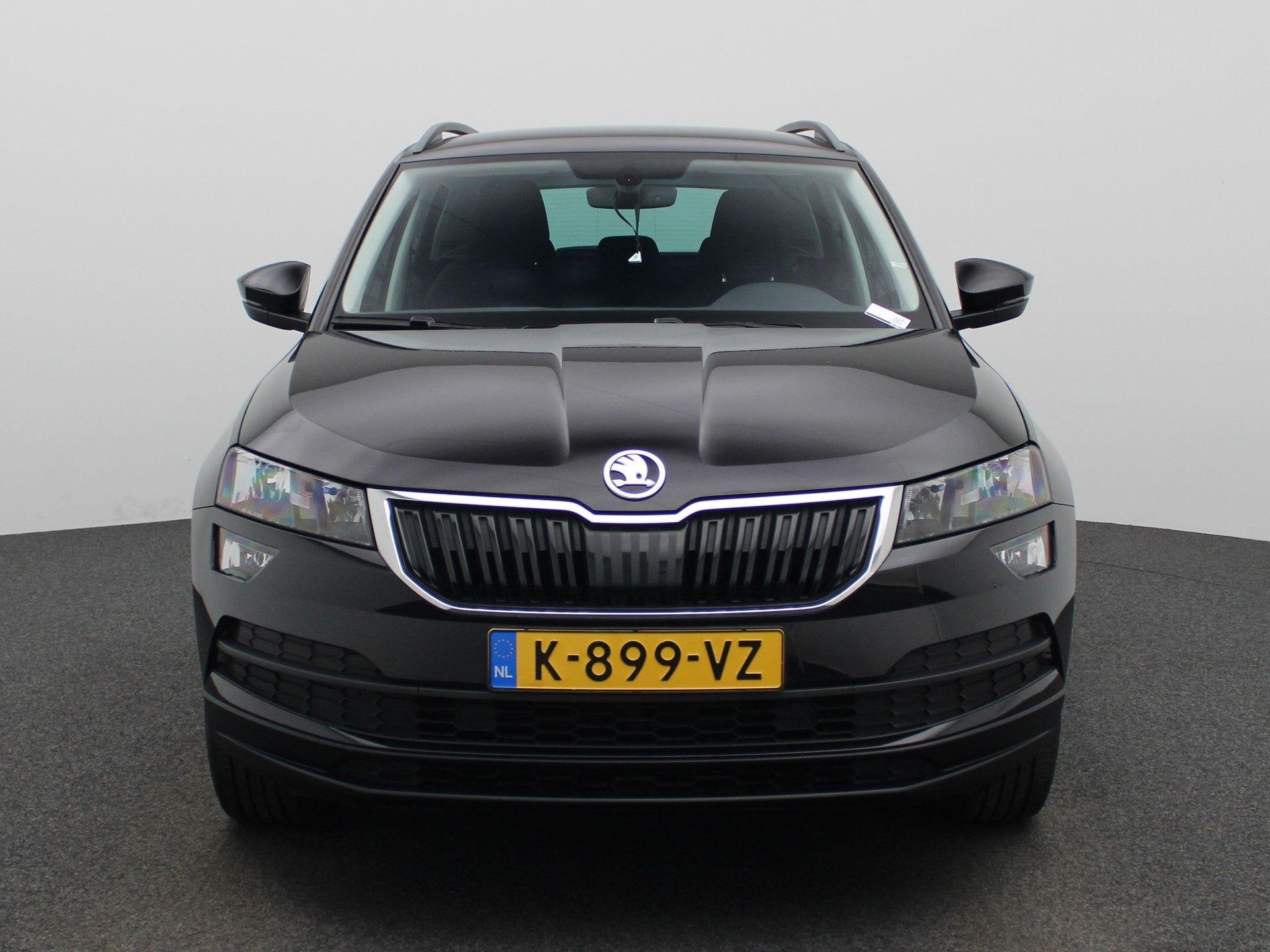 Skoda Karoq 1.0 TSI Business Edition | SUNSET | PARKEERSENSO, Auto's, Stof, Gebruikt, Zwart, Handgeschakeld