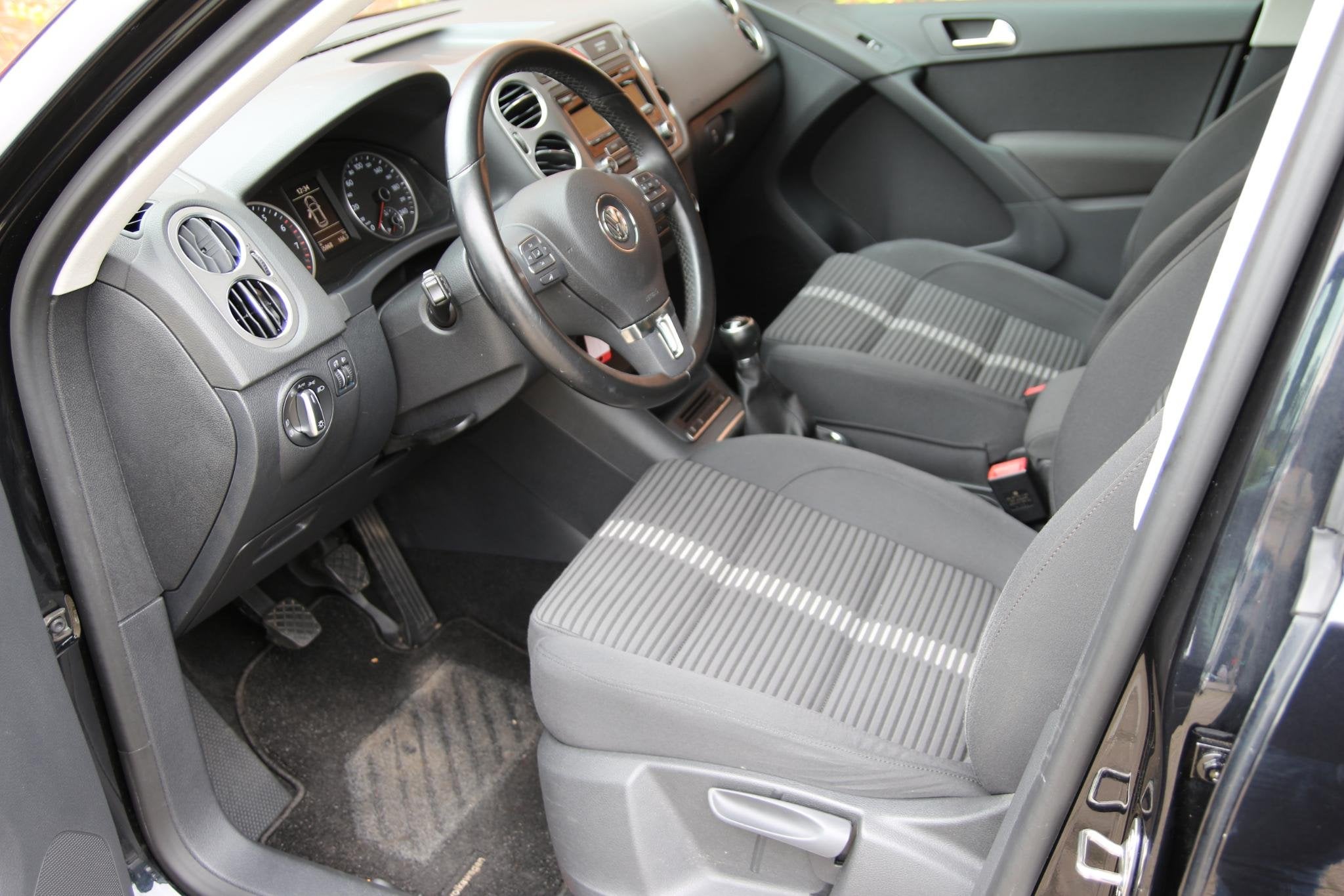 Volkswagen Tiguan 1.4 TSI 150pk Sport&Style UNIEK! | NL-auto, Auto's, Voorwielaandrijving, Euro 5, Zwart, 4 cilinders