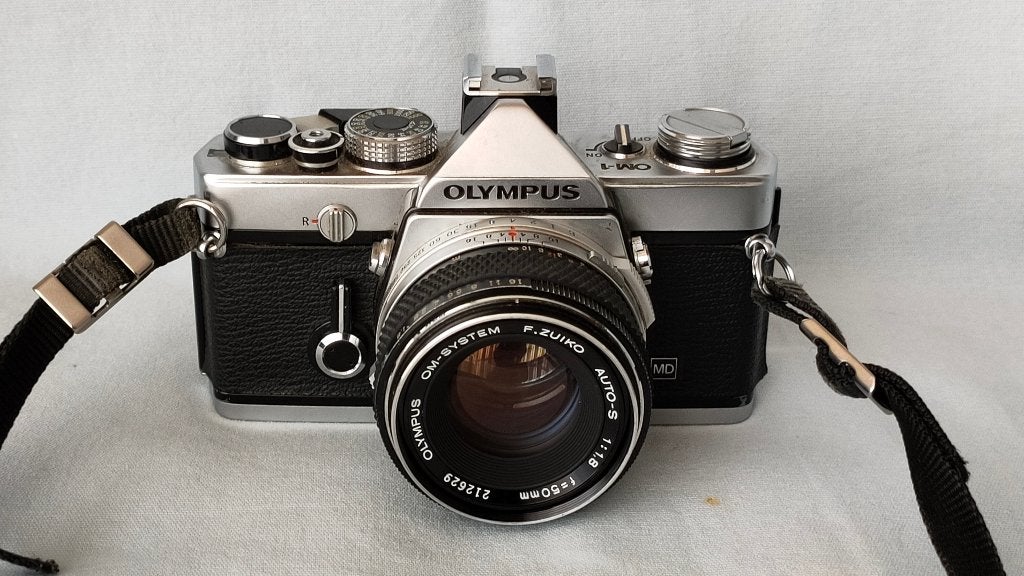 Olympus OM-1 analoge fotocamera met lenzen en handleidingen, Ophalen, Gebruikt, Spiegelreflex, Olympus