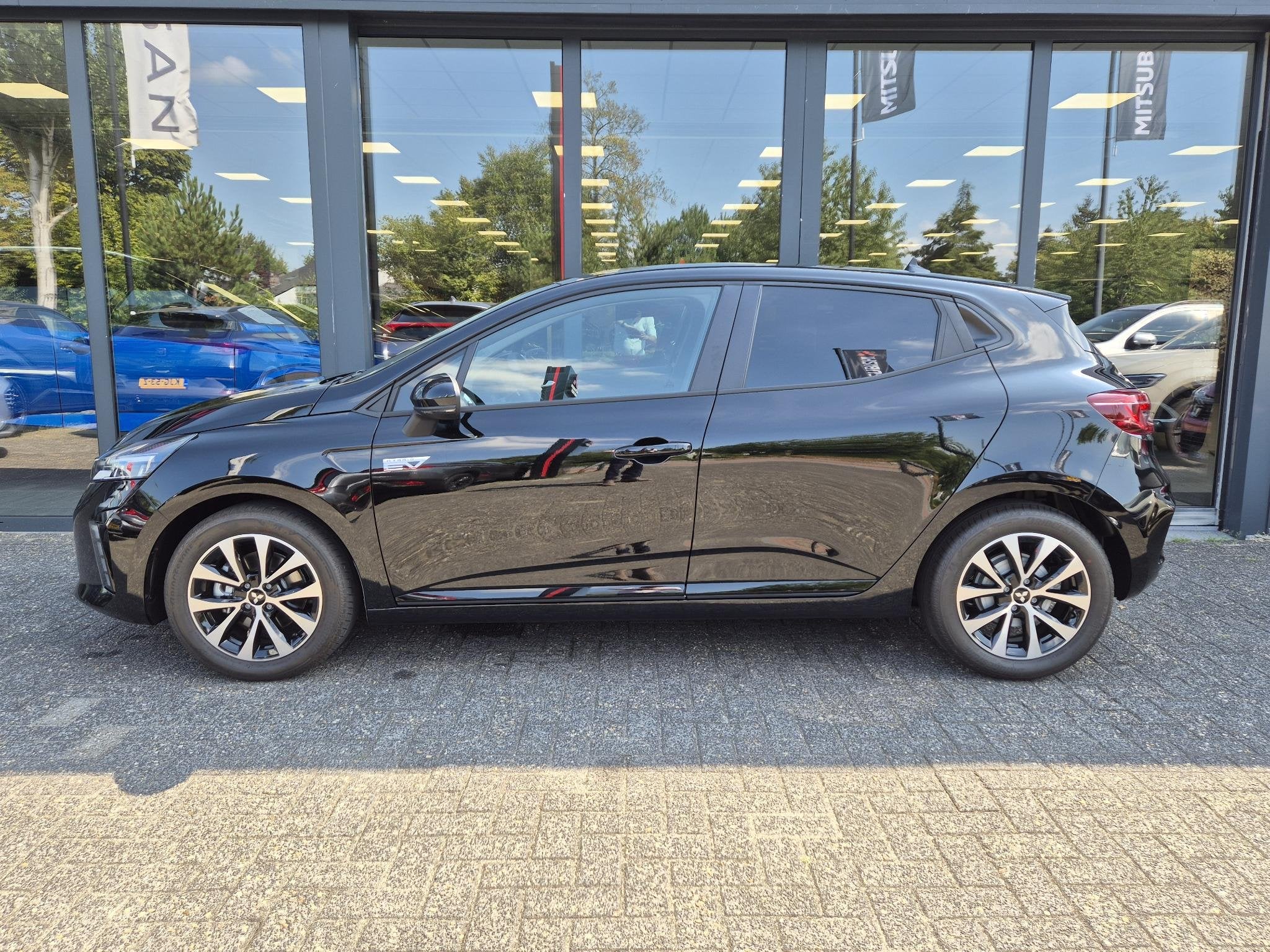 Mitsubishi Colt 1.6 HEV Intense | Uit voorraad leverbaar | A, Stof, Met garantie (alle), Bedrijf, Nieuw