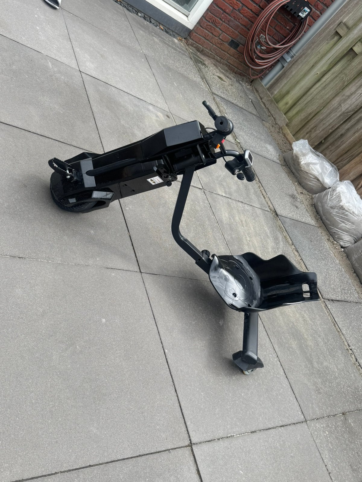 Elektrische driewieler, Ophalen, Gebruikt