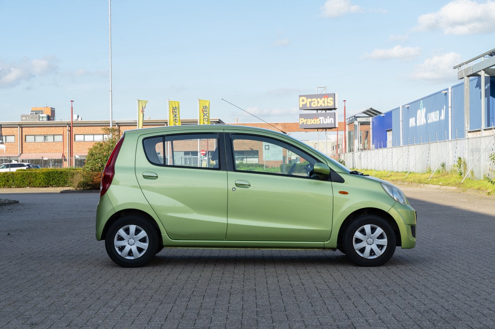 Daihatsu Cuore 1.0 5D AUT 2011 Groen, Auto's, Stof, 600 kg, Zwart, 18 €/maand