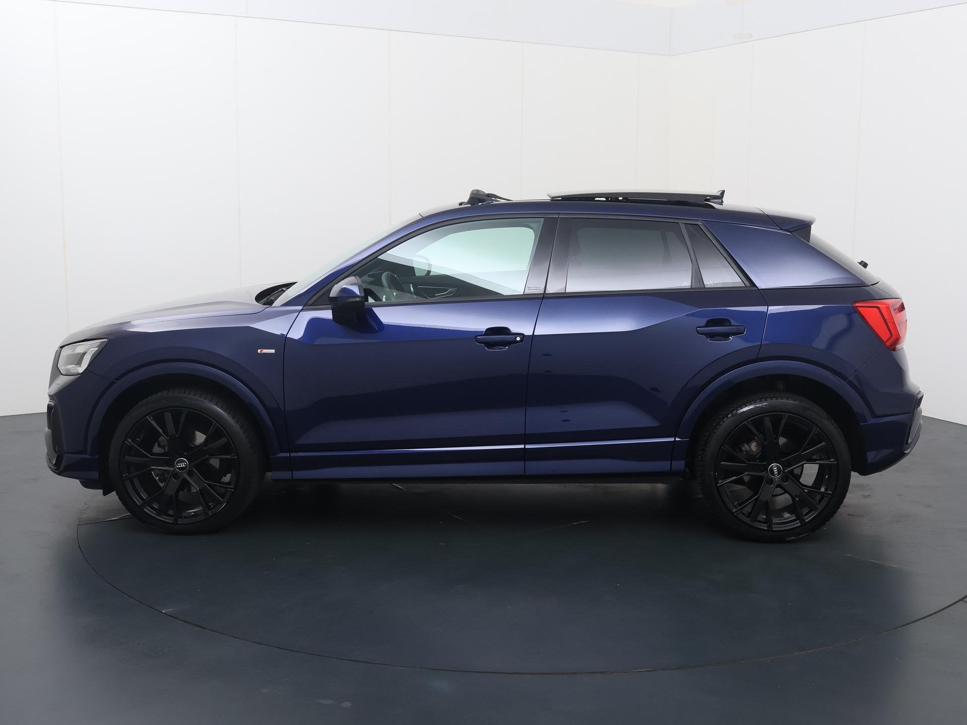 Audi Q2 35 TFSI S Edition | 150 PK | Automaat | Trekhaak |, Auto's, 12 maanden, 4 cilinders, Blauw, Leder en Stof