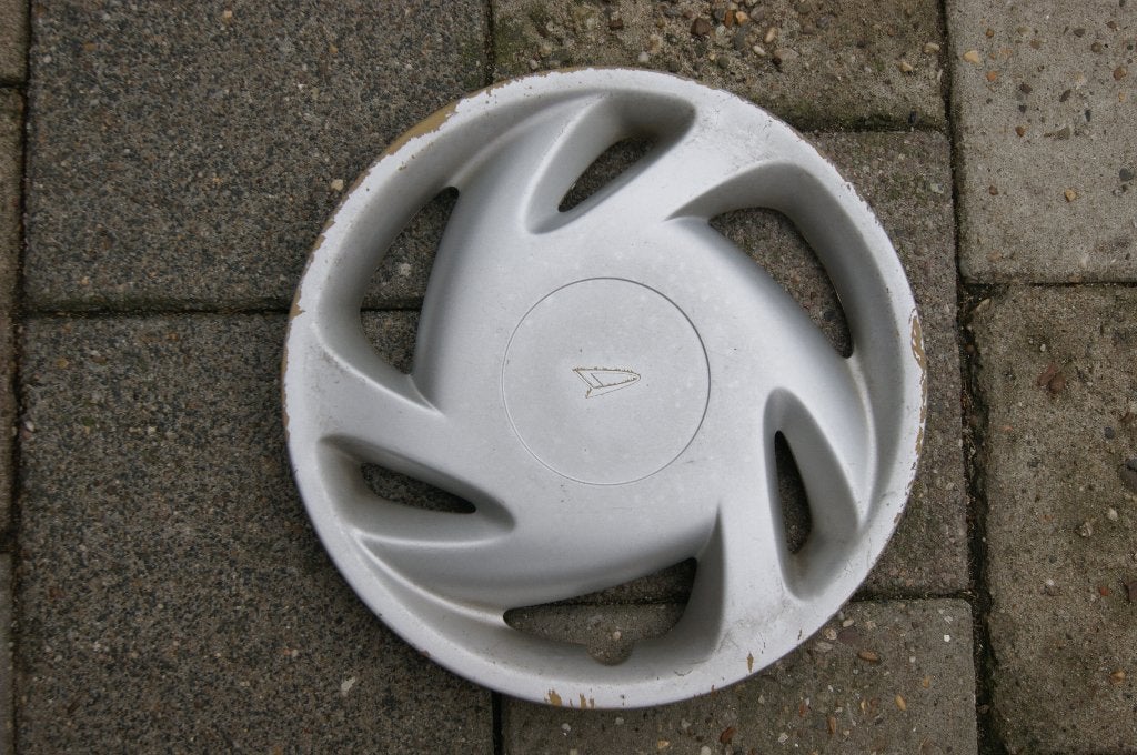 1 losse originele wieldop Daihatsu Sirion 14 inch, Ophalen of Verzenden, Gebruikt