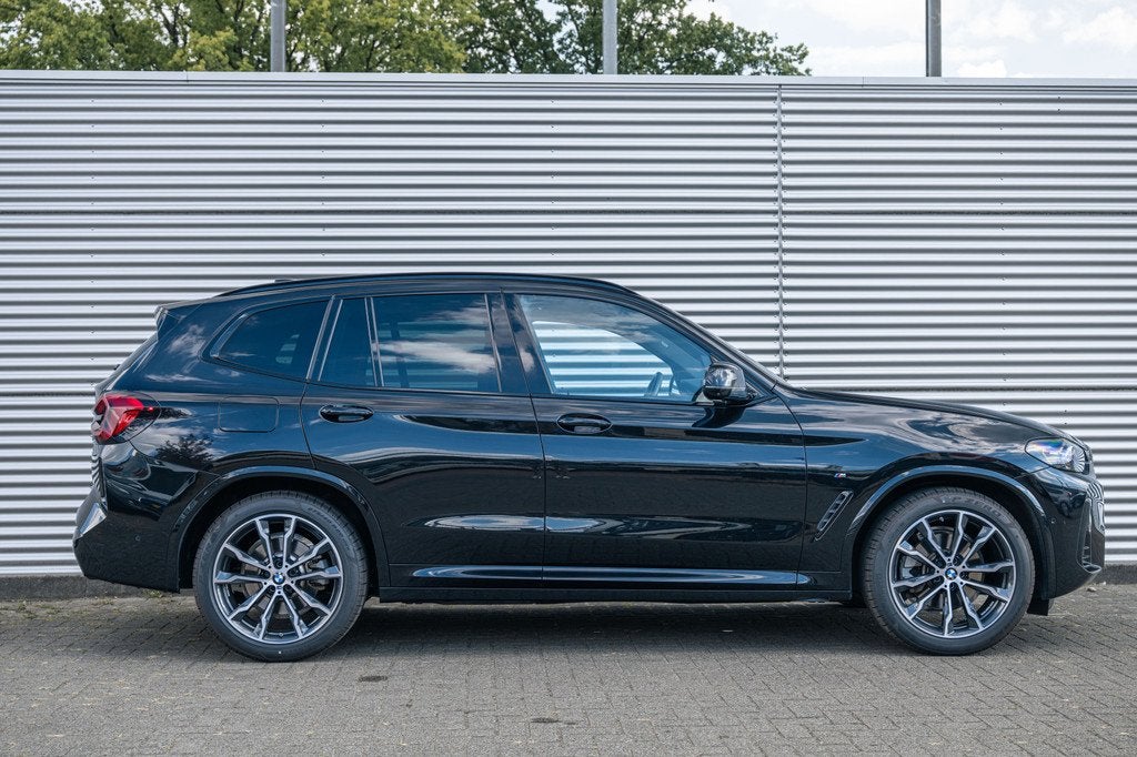 BMW X3 xDrive20i High Executive M Sport Automaat / Panoramad, Auto's, BMW, 1998 cc, 4 cilinders, Zwart, Bedrijf