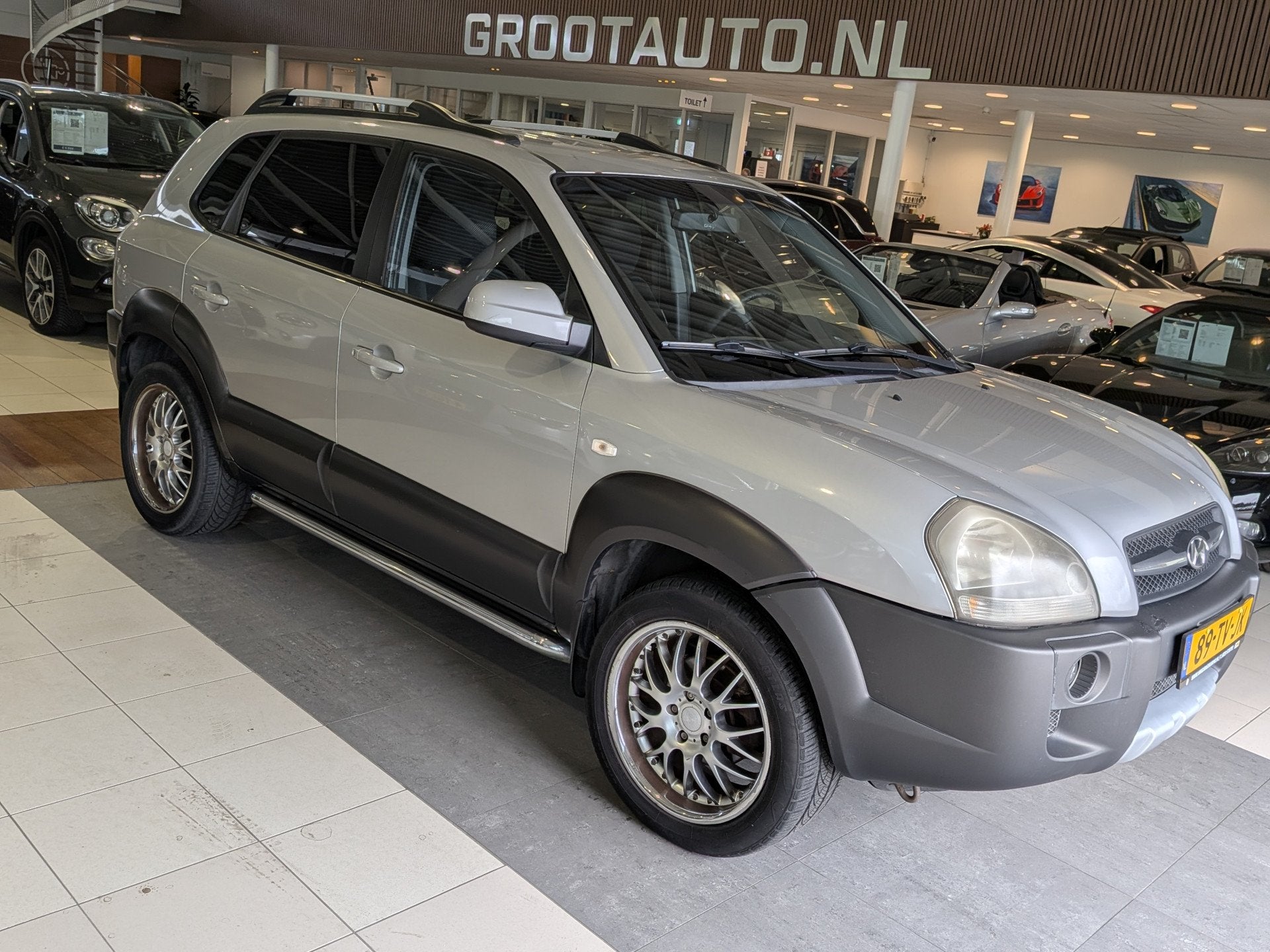 Hyundai Tucson 2.0i Dynamic Cross Airco, Cruise Control, Tre, Parkeersensor, Stof, Gebruikt, Zwart