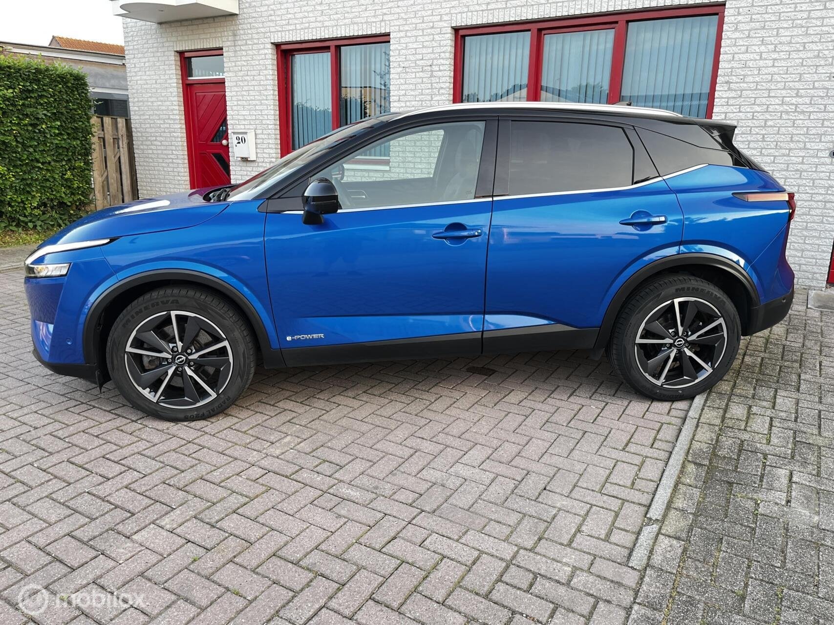 Nissan Qashqai 1.5 e-Power Tekna PANODAK/LEER/360CAM, Auto's, 1497 cc, Gebruikt, Zwart, Blauw