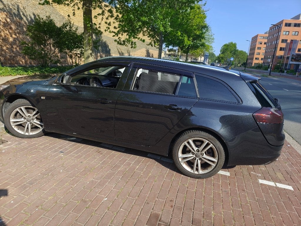 Opel Insignia 1.6 Turbo Sport Tourer 180pk 2010 Zwart, Auto's, Opel, 4 cilinders, 179 pk, Leder en Stof, Zwart