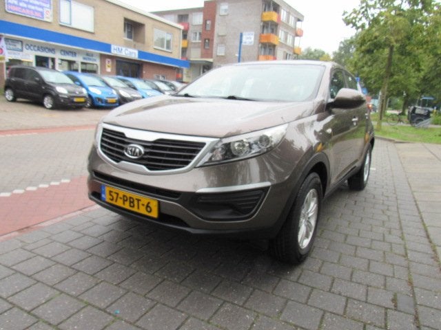 KIA Sportage 2.0 CVVT X-tra, Auto's, Gebruikt, 4 cilinders, Bruin, 163 pk