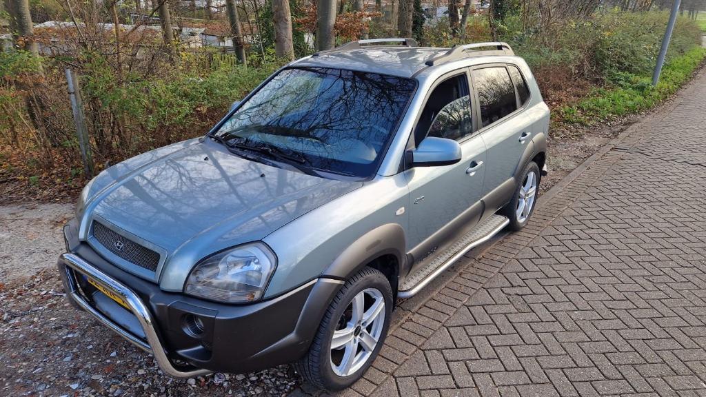 Hyundai Tucson 2.7 I 4WD AUT 2005 Grijs, Auto's, Hyundai, Automaat, 2656 cc, Particulier, 1600 kg