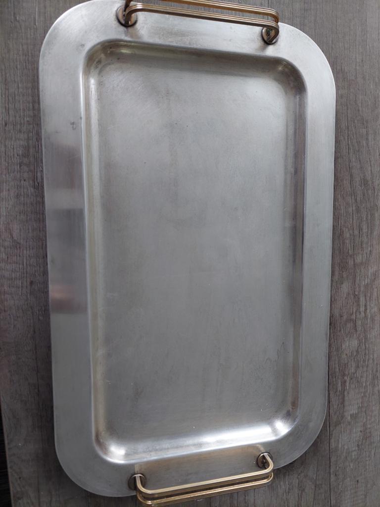 Dienblad van verzilverd messing, Ophalen