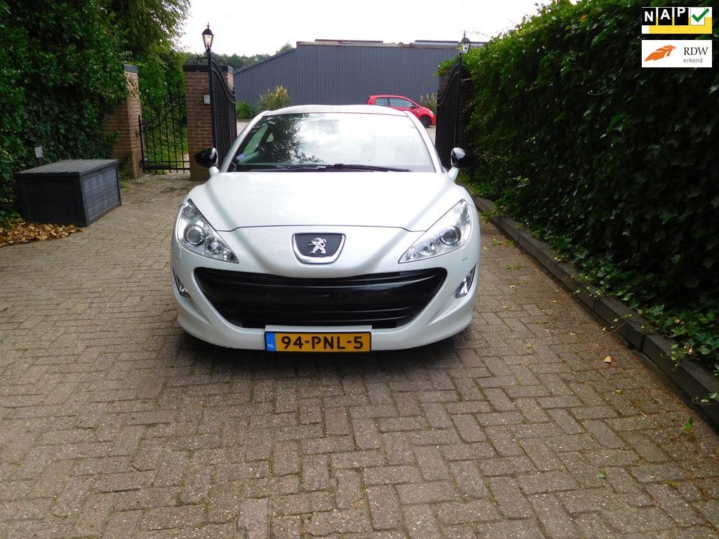 Peugeot RCZ 1.6 THP met alle onderhoud boeken en nap aanwezi, Auto's, Voorwielaandrijving, Gebruikt, Zwart, 4 cilinders