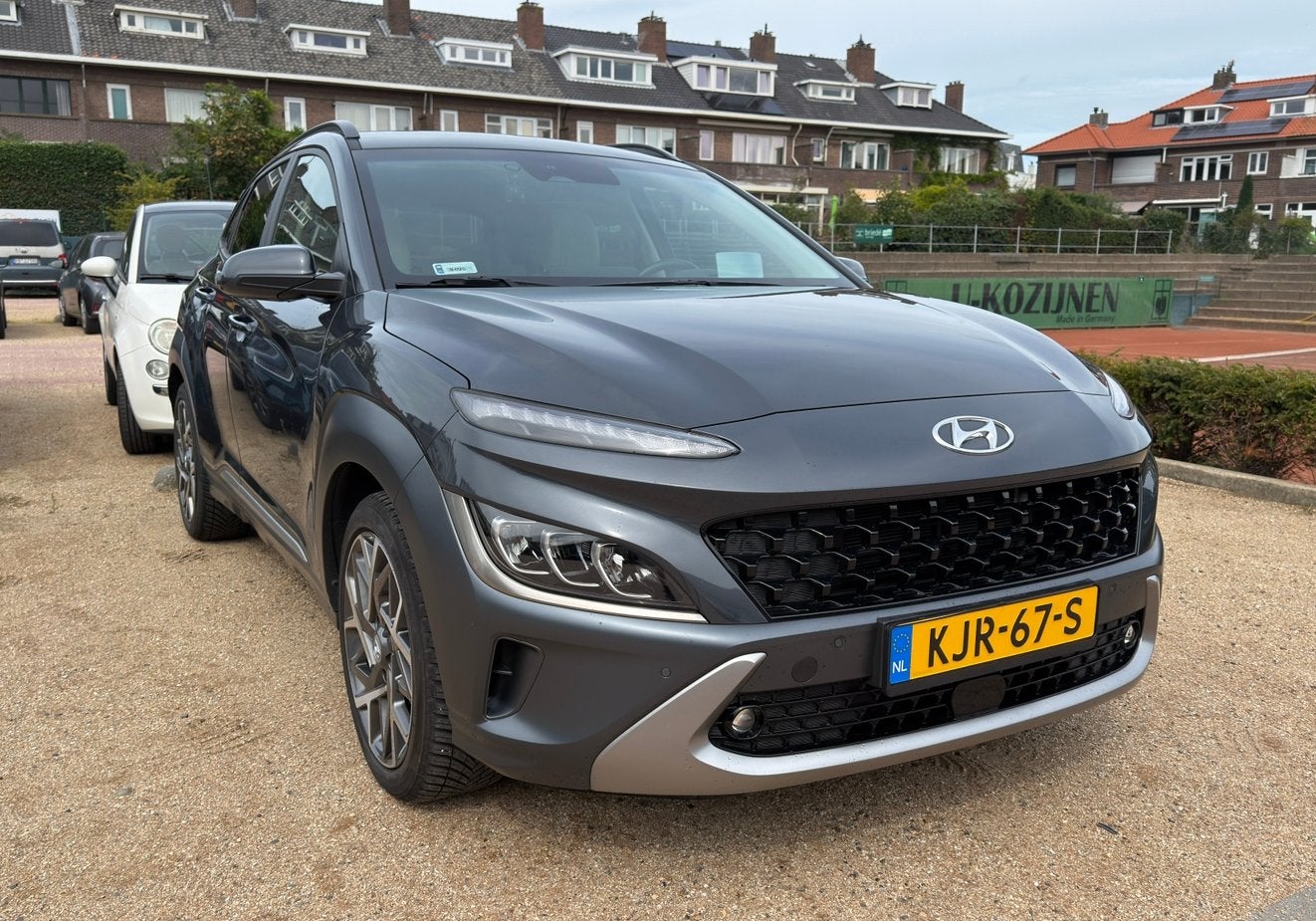 2021 Hyundai Kona Premium Hybrid Full Option Wit Leder 48kkm, Auto's, Dealer onderhouden, 23 km/l, Lichtsensor, SUV of Terreinwagen