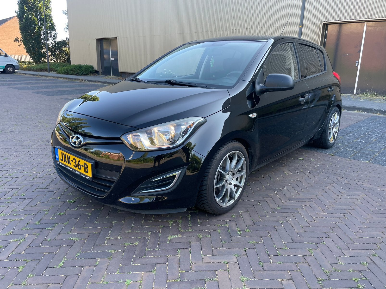 Hyundai i20 1.2 I 5-DRS 2014 Zwart, Auto's, Zwart, 4 cilinders, Zwart, Handgeschakeld