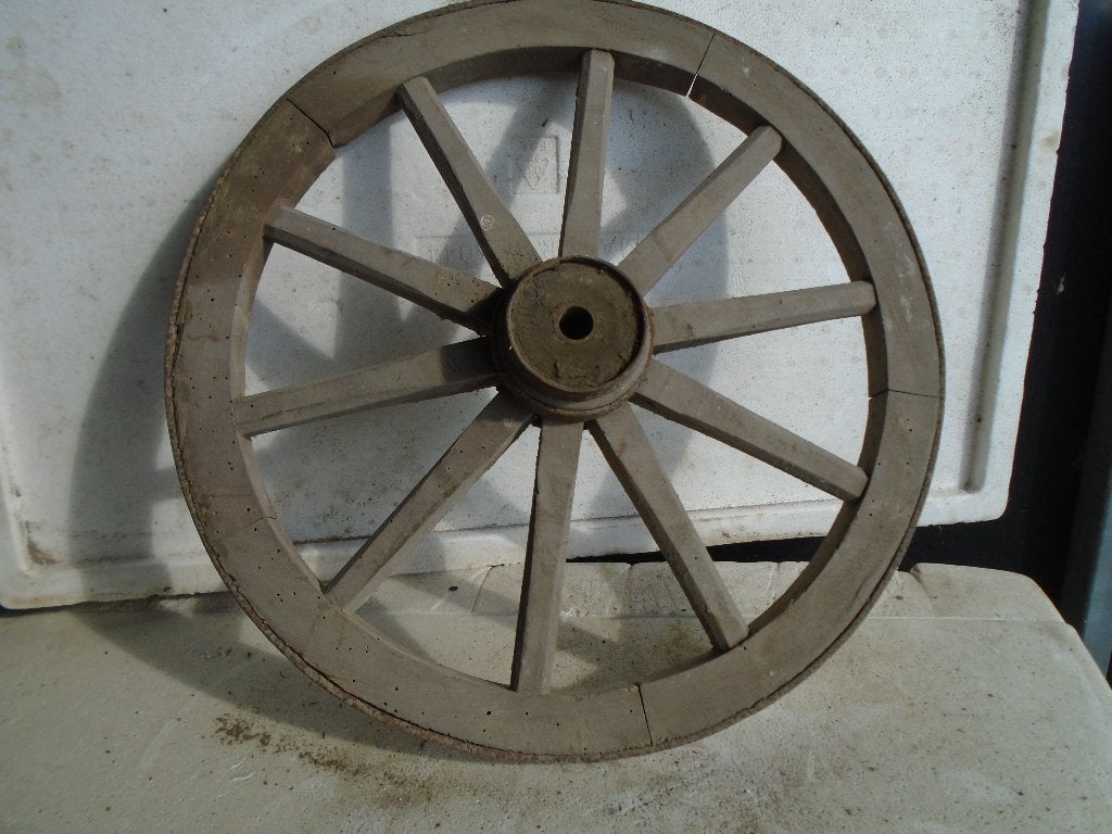 houten wiel  van bokkenwagen, Ophalen