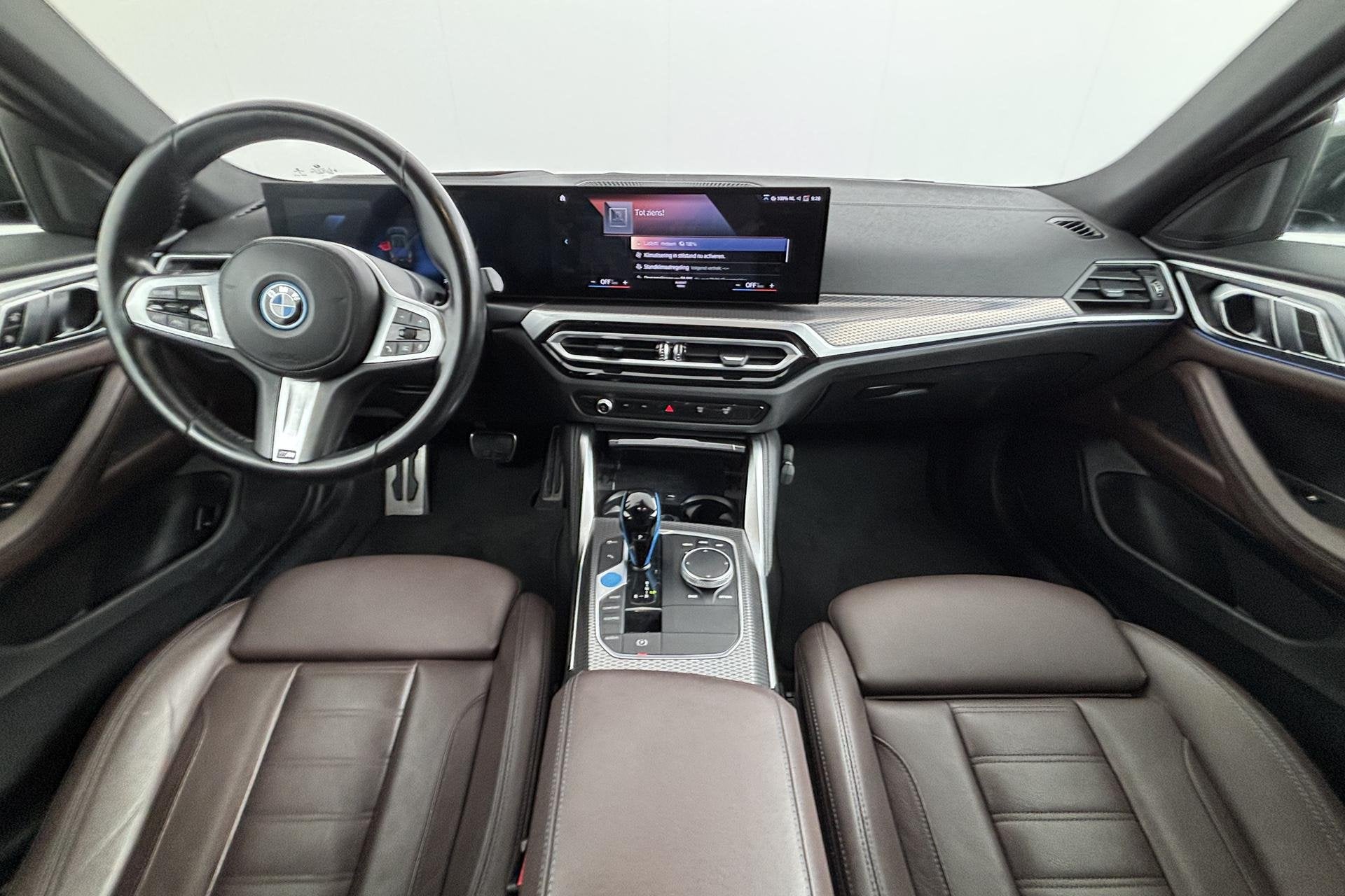 BMW i4 eDrive40 High Executive 84 kWh Groene glans, sportiev, Auto's, Achterwielaandrijving, 340 pk, Origineel Nederlands, 2025 kg