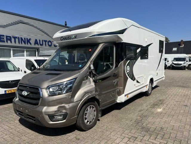 Chausson 747GA PREMIUM AUTOM. LENGTE BED HEFBED GARAGE, Caravans en Kamperen, Campers, Automaat, Airconditioning, Half-integraal