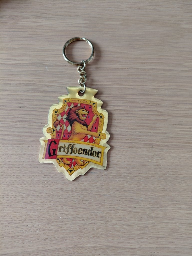 harry potter griffoendor 2001 warner bross sleutelhanger, Verzamelen, Harry Potter, Ophalen of Verzenden, Zo goed als nieuw, Gebruiksvoorwerp