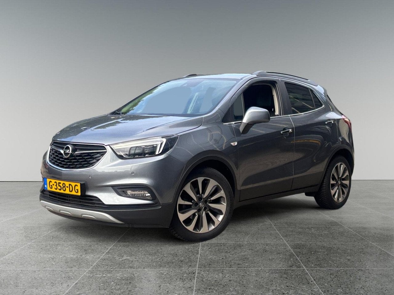 Opel Mokka X Innovation+ 1.4 Turbo 140pk | TREKHAAK | LEDER, Auto's, Dealer onderhouden, Gebruikt, Leder, Bedrijf