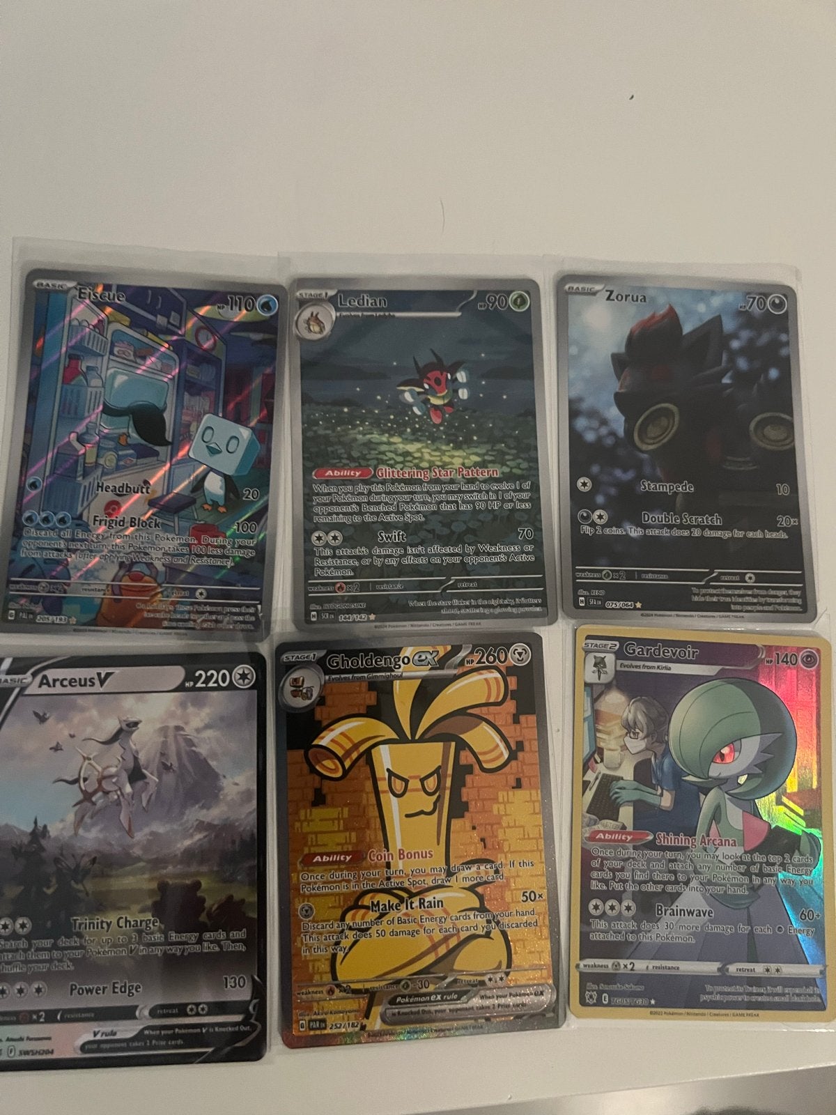 Pokémon kaarten set: Eiscue, Ledyba, Zorua, Arceus V, Gholde, Ophalen of Verzenden, Zo goed als nieuw, Meerdere kaarten, Foil