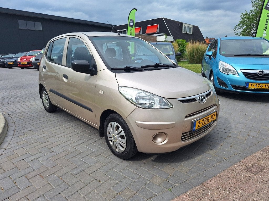 Hyundai I10 1.1 Active Cool / Super zuinig / Slechts 106.394, Auto's, Hyundai, Voorwielaandrijving, Gebruikt, 31 €/maand, Bruin