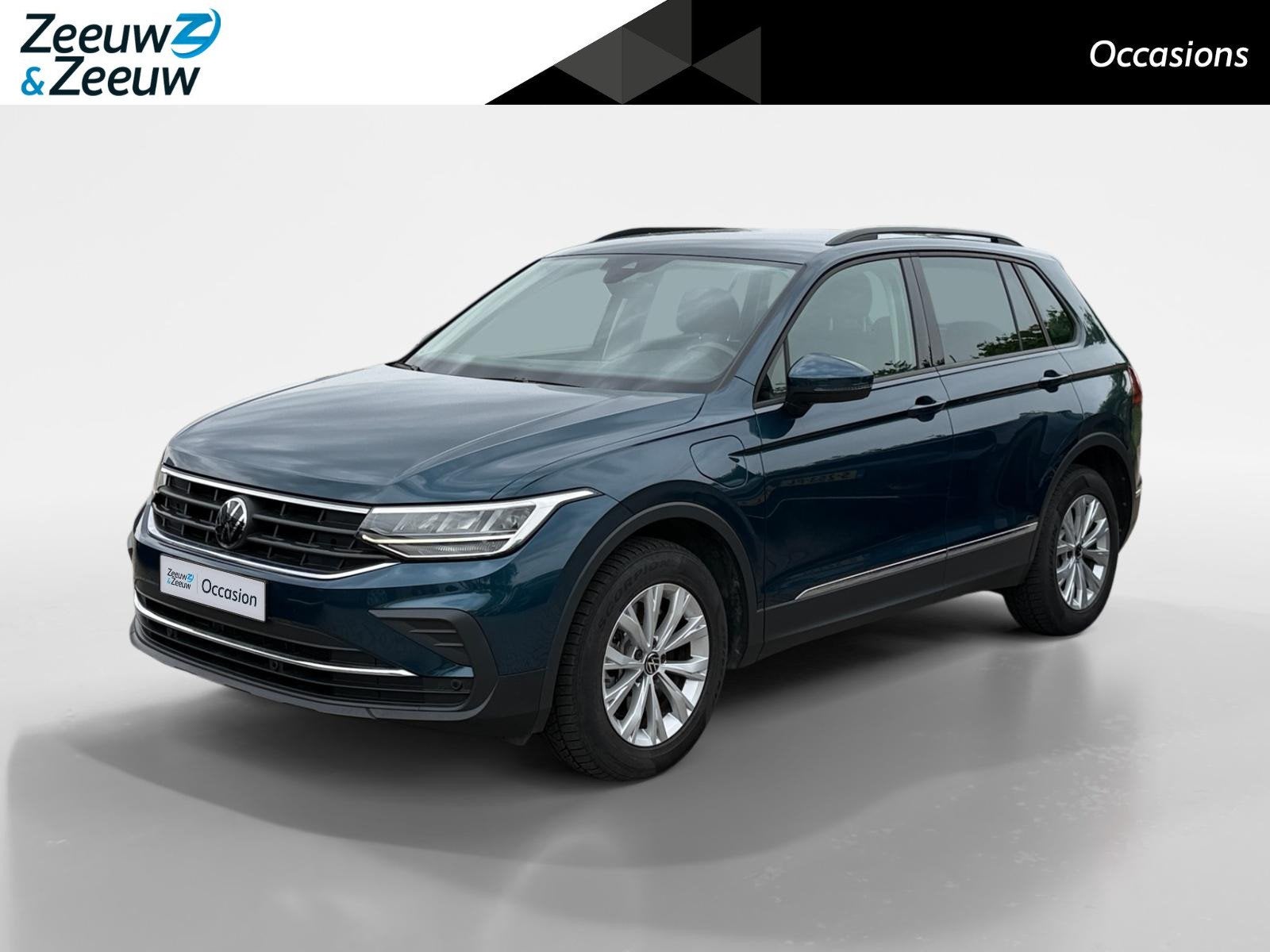 Volkswagen Tiguan 1.4 TSI HYBRIDE, | Metallic | LM velgen |, Auto's, Stof, 4 cilinders, Blauw, Verwarmde buitenspiegels