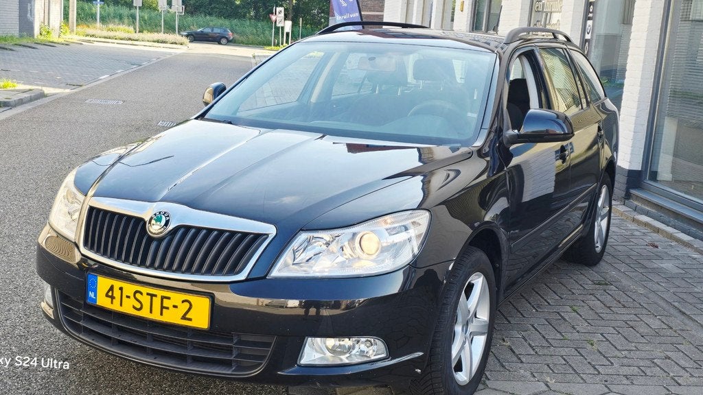 Skoda Octavia Combi 1.2 TSI Ambition*2e eig*navi*airco*trekh, Auto's, Skoda, Voorwielaandrijving, Euro 5, Gebruikt, Parkeersensor