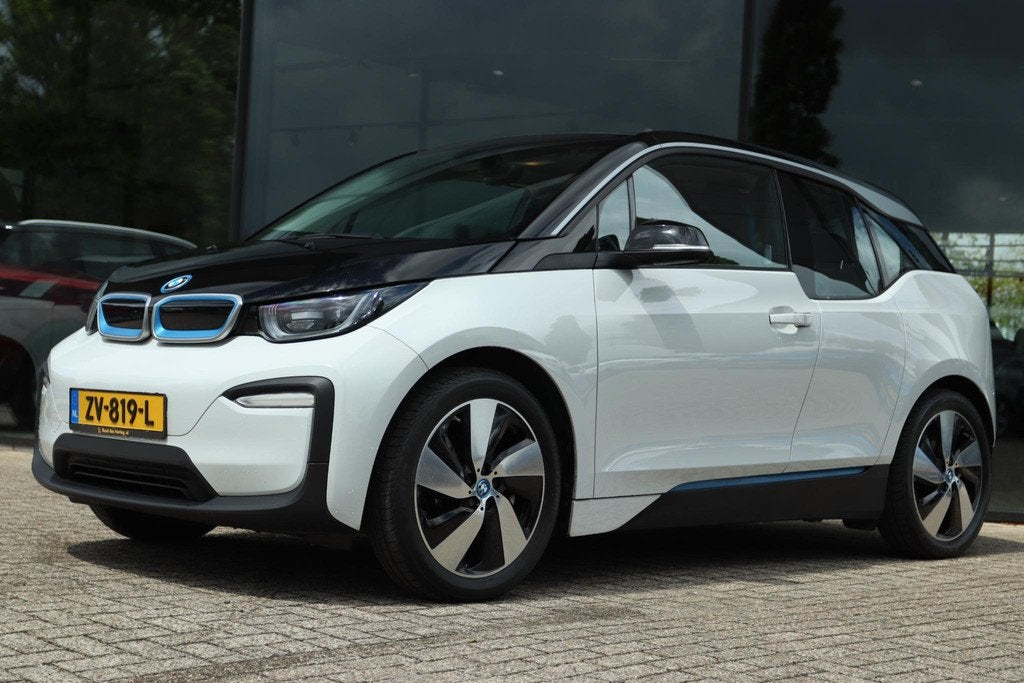BMW I3 BASIS 120AH 42KWH SOH 94% | NAVI | ORIG NL | PDC | LE, Auto's, BMW, Automaat, 4 stoelen, 258 min, Wit